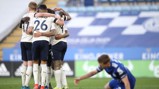 GROUP HUG: Jesus feeling the love after scoring the second goal of the game.