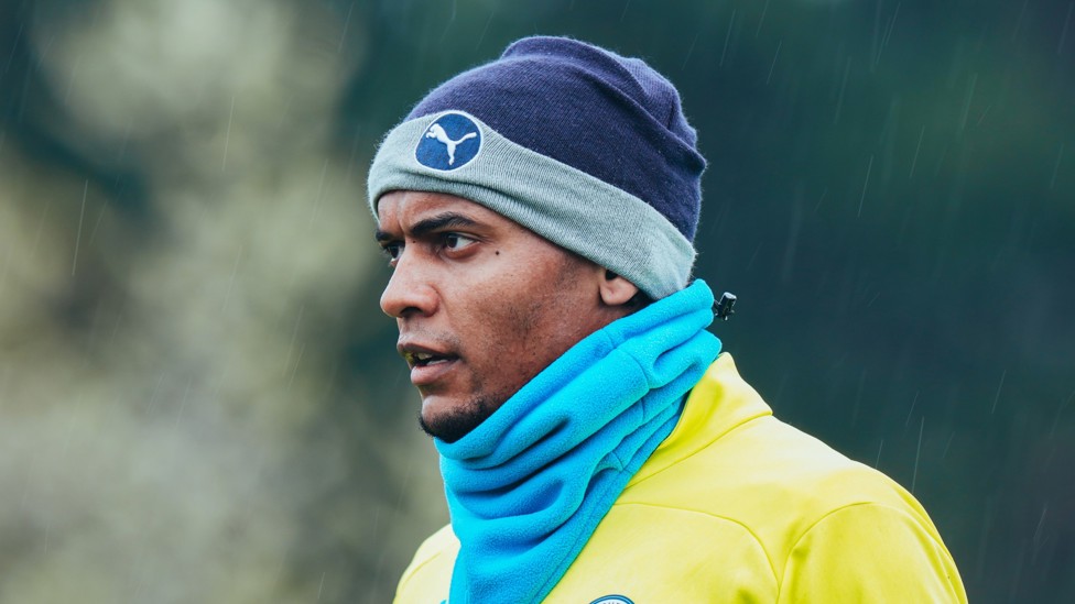 WRAPPING UP : Manuel Akanji braves the elements