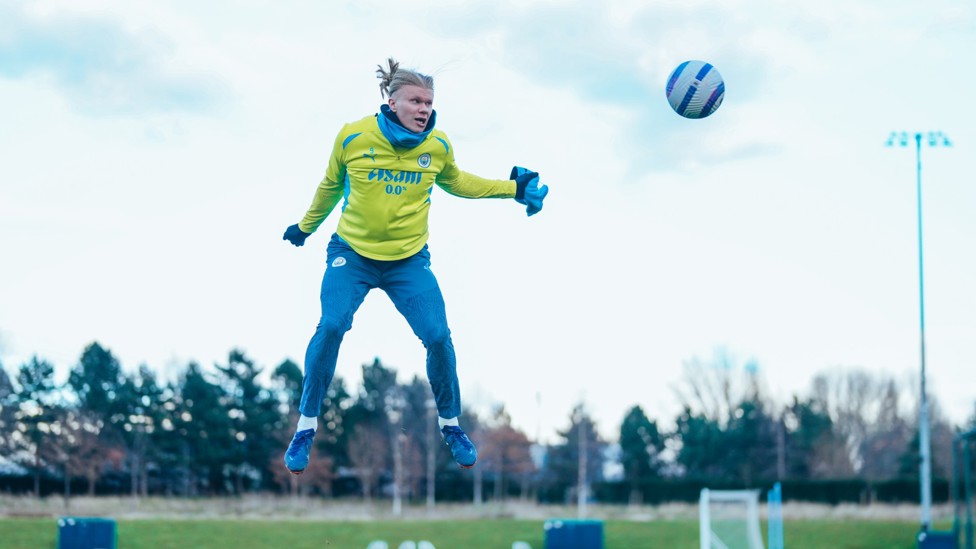 GET HIGH : Haaland leaps to head at goal