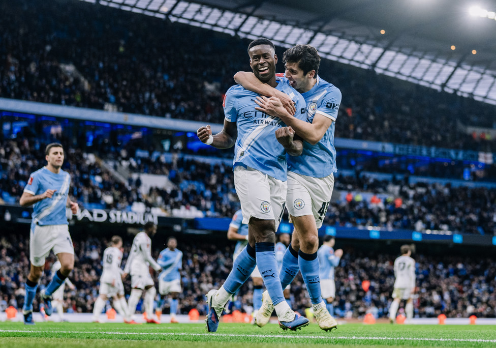 DANGEROUS DUO : Marc Guéhi and Khusanov celebrate the former’s FA Cup goal against Salford.  