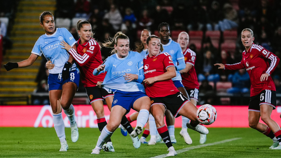 Not backing down : Lauren Hemp grapples with her fellow Lioness
