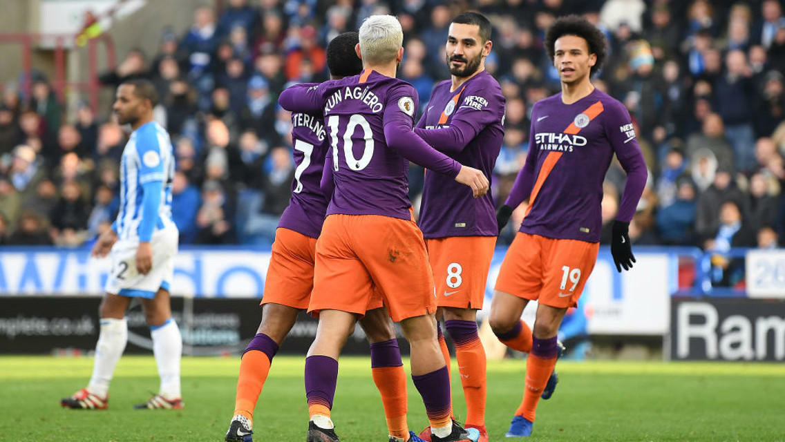 RAZZLE DAZZLE: The Blues salute Raheem Sterling after his header made it 2-0