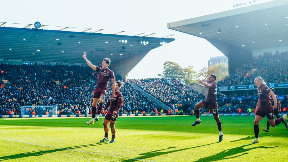 LAST-MINUTE WINNER : John Stones celebrates his goal at Wolves