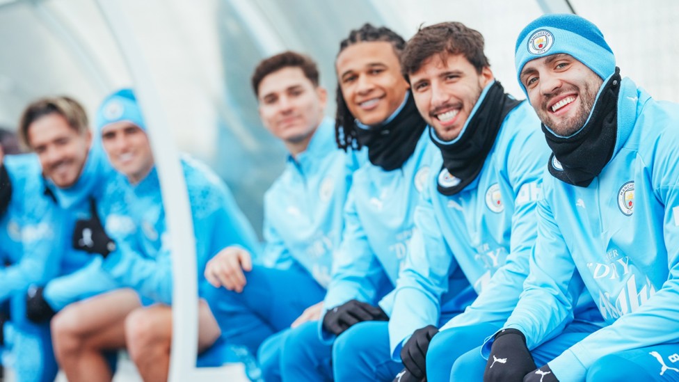 ALL SMILES  : City's squad in fine spirits ahead of the trip to Red Star Belgrade.