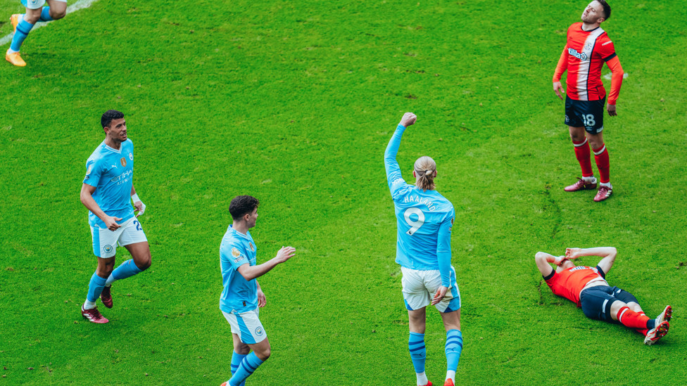 EARLY STRIKE : Haaland celebrates after his shot deflects in - what a start!