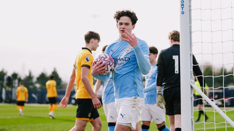 MATCH BALL SECURED : Teddie Lamb after confirming his hat-trick. 