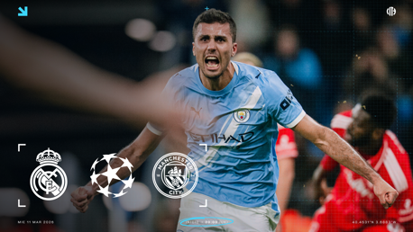 A Manchester City player in a light blue uniform is celebrating on the field. The image features the logos of Manchester City and Real Madrid, indicating a clash between these teams on March 11, 2026, during the UEFA Champions League.