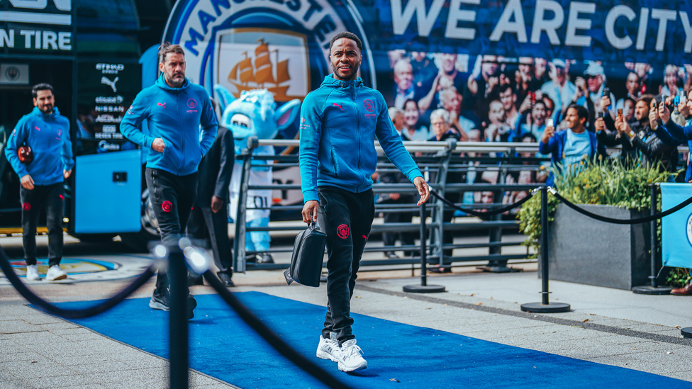 ARRIVAL : Sterling and co make their way into the Etihad.