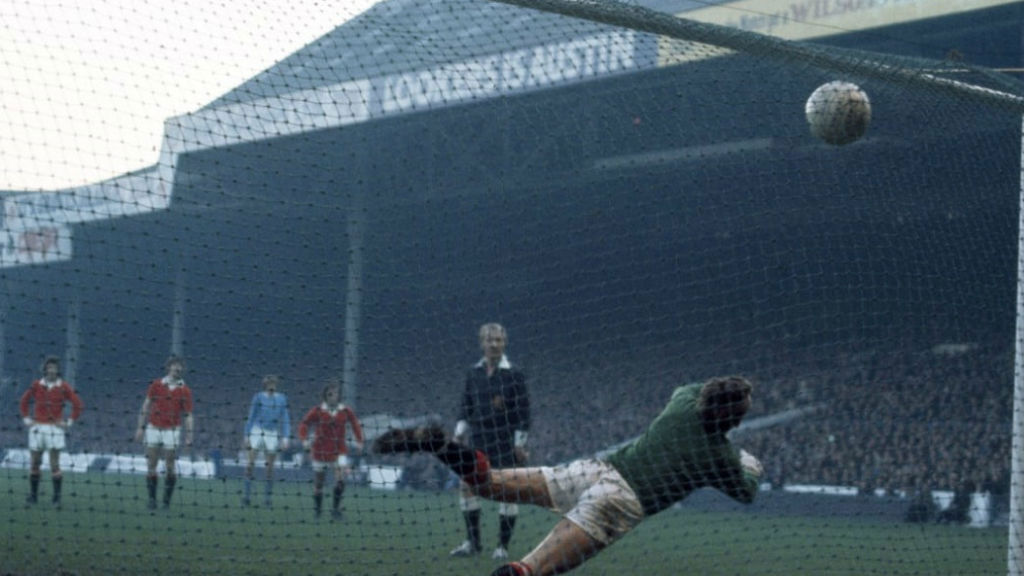 SPOT ON: Francis Lee lashes home from the penalty spot against Manchester United