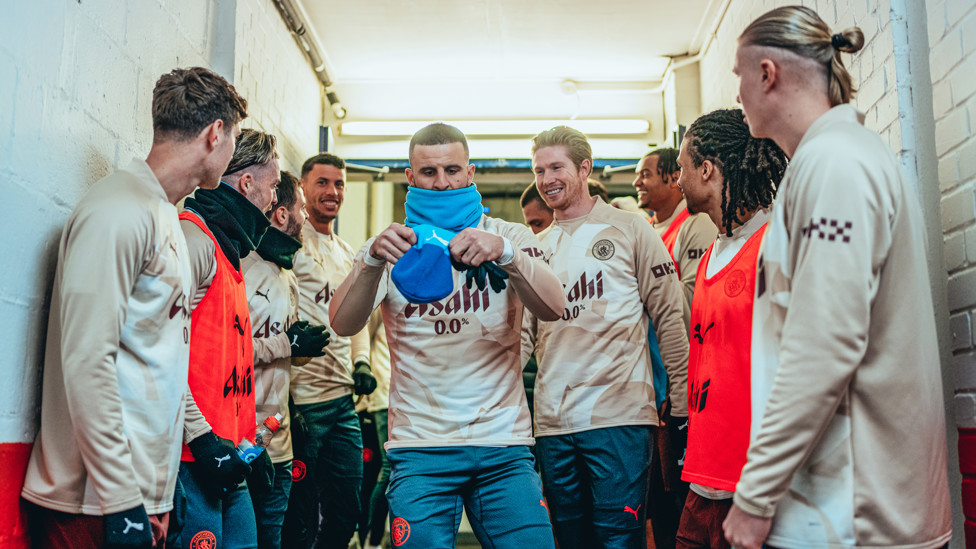 SKIPPER FIRST : Walker leads the team out for the pre-match warm up.
