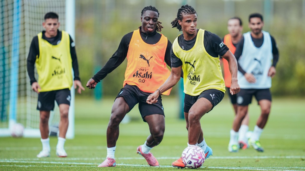 DUELING : Nathan Ake and Jeremy Doku go head to head