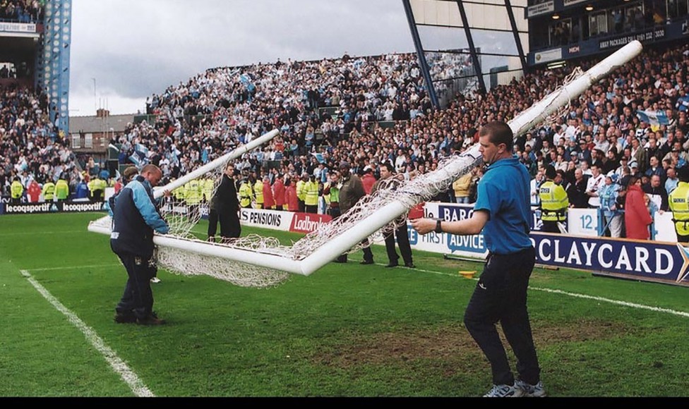 THE  LAST POST: The City groundstaff remove the posts for the final time