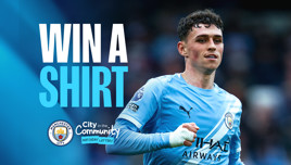Promotional image for Manchester City's 'Win a Shirt' contest featuring a player in the team's light blue kit.