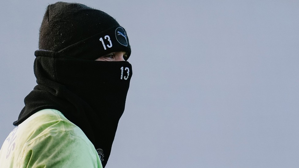 GUESS WHO? : One of the goalkeepers watches on