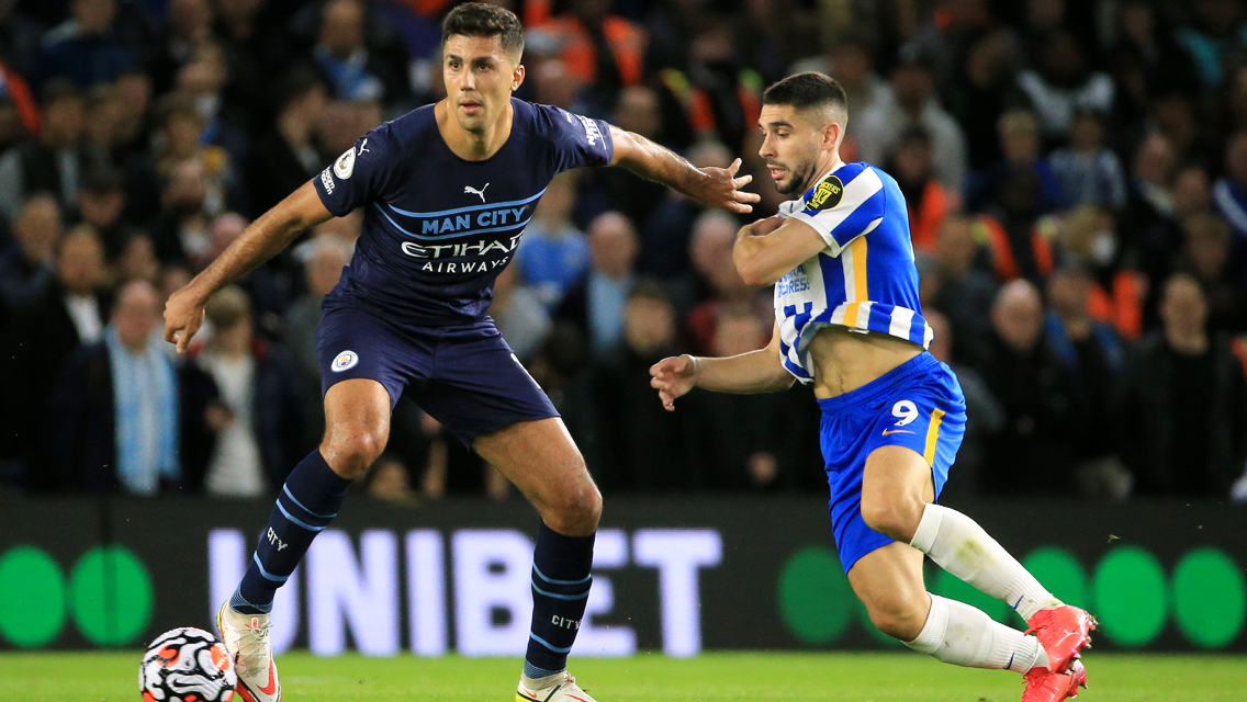KEEP AWAY: Rodri holds off Maupay.