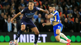 KEEP AWAY: Rodri holds off Maupay.