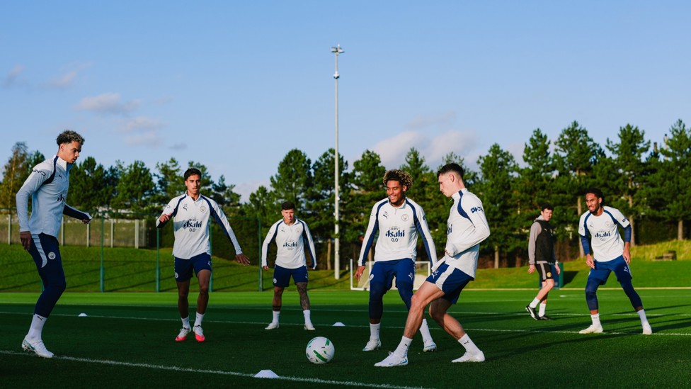 ALL SMILES : The team enjoy some rondos. 