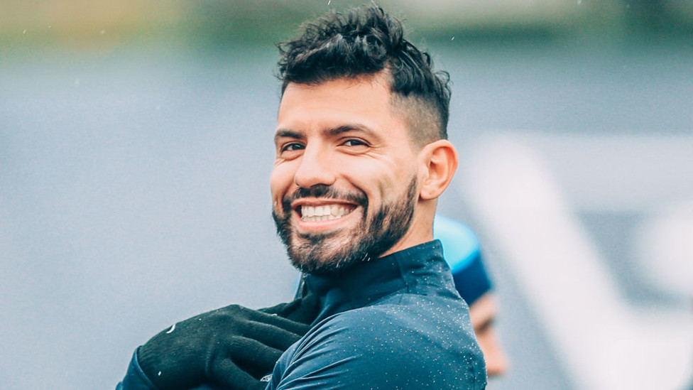 STRIKER POSE : Sergio Aguero smiles for the camera