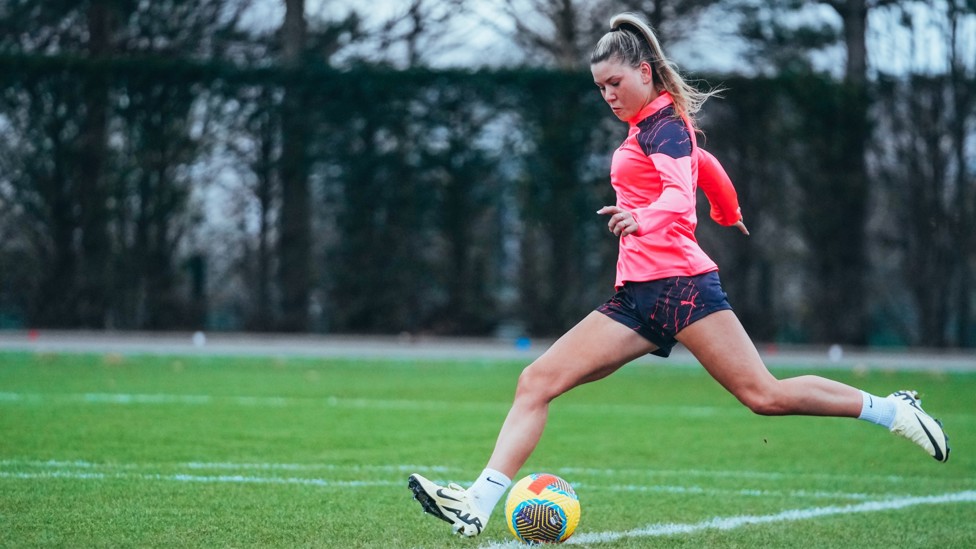 STRIKE : Poppy Pritchard puts her foot through the ball.