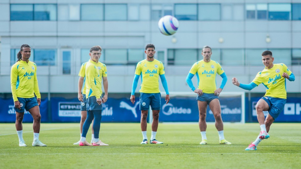 SQUAD GOALS: Claudio Echeverri goes for goal as his team mates look on.
