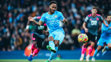 STERLING JOB: Raheem makes it four with another expertly taken spot kick.