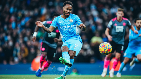 STERLING JOB: Raheem makes it four with another expertly taken spot kick.