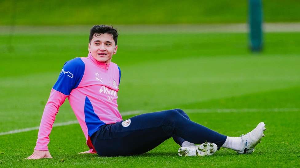 SITTING DOWN ON THE JOB : Abdukodir Khusanov hits the deck