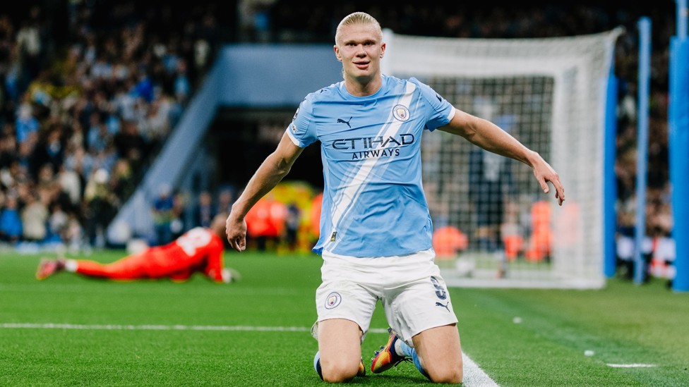 SLIDE AWAY  : Haaland celebrates. 