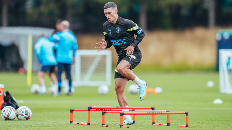 STEP TO IT : Phil Foden goes through a fitness drill