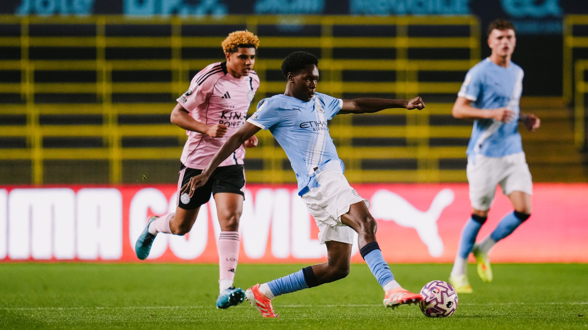 MIGHTY IN MIDFIELD : Femi Fapetu orchestrates play.