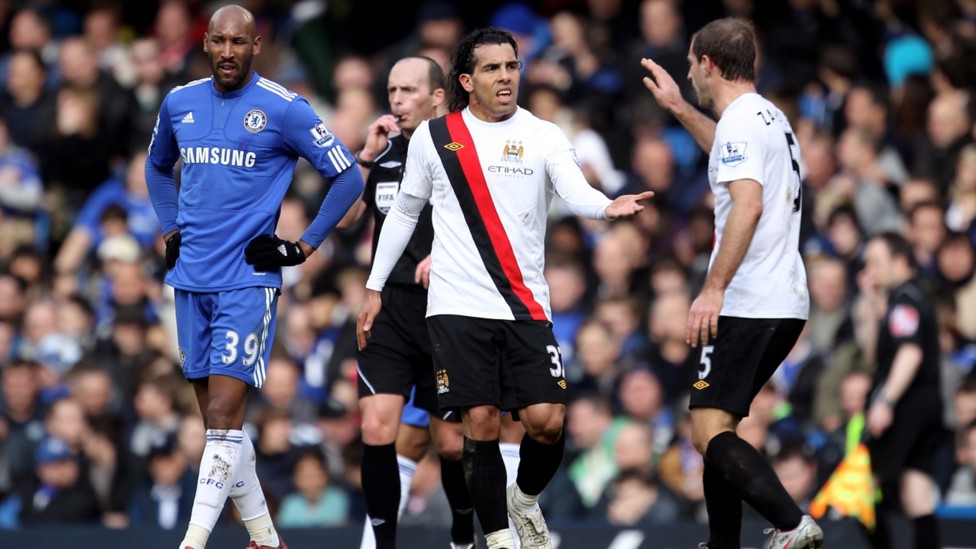 LETHAL LATIN: Carlos Tevez celebrates a goal at Chelsea with fellow Argentine and City icon Pablo Zabaleta.