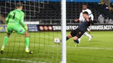FINE MARGINS: Ferran Torres does his best to get a touch on Kyle Walker's goal