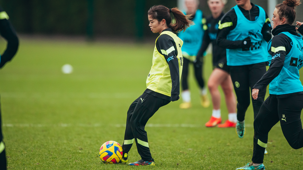 CLOSE CONTROL : Yui Hasegawa brings the ball under her spell