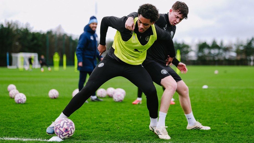 LET BATTLE COMMENCE : Floyd Samba looks to hold off Kian Noble. 