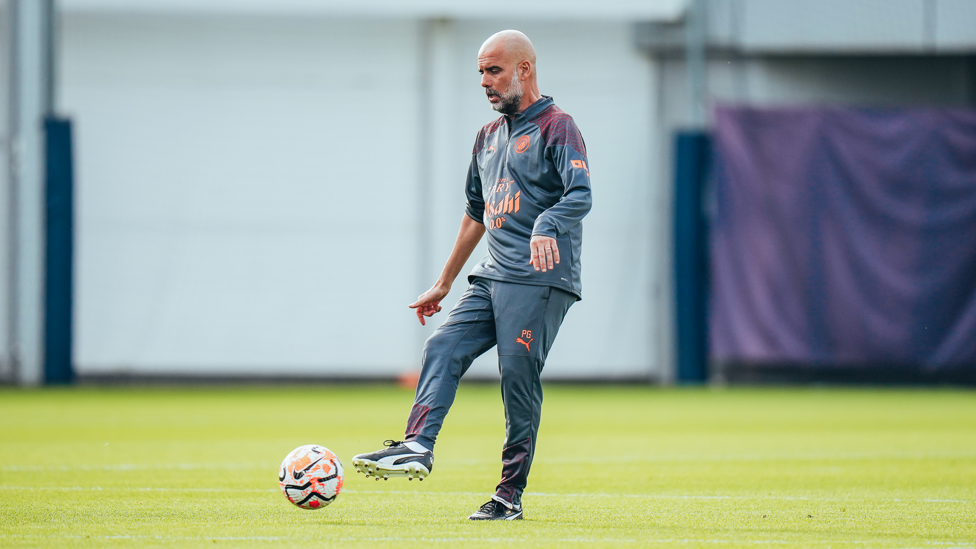 BOSSING IT : Pep Guardiola gets involved