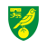 A green and yellow shield featuring a stylized bird perched on a ball with a castle and lion in the background.