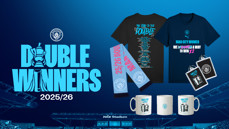 Manchester City celebrates their 2025/26 double win with merchandise including t-shirts, mugs, and scarves.