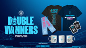 Manchester City celebrates their 2025/26 double win with merchandise including t-shirts, mugs, and scarves.