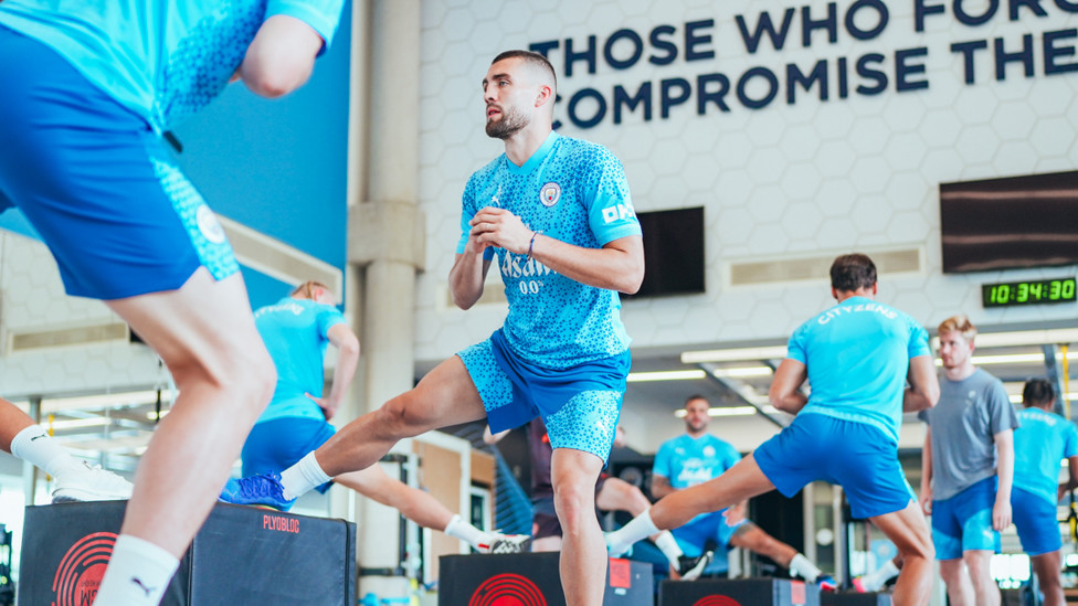 LIMBERING UP  : Mateo Kovacic gets warm inside the gym.