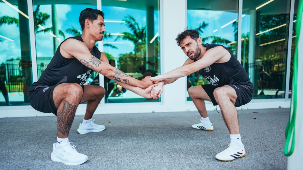 HAND IT TO THEM : Bernardo Silva makes Tijjani Reijnders feel welcome