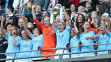 UP FOR THE CUP: Skipper Steph Houghton hoists the FA Cup aloft