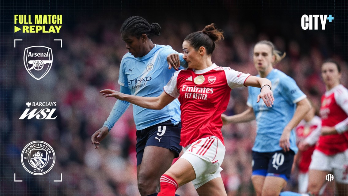 Action from a Women's Super League match between Arsenal and Manchester City, featuring players with Arsenal and Manchester City logos visible.