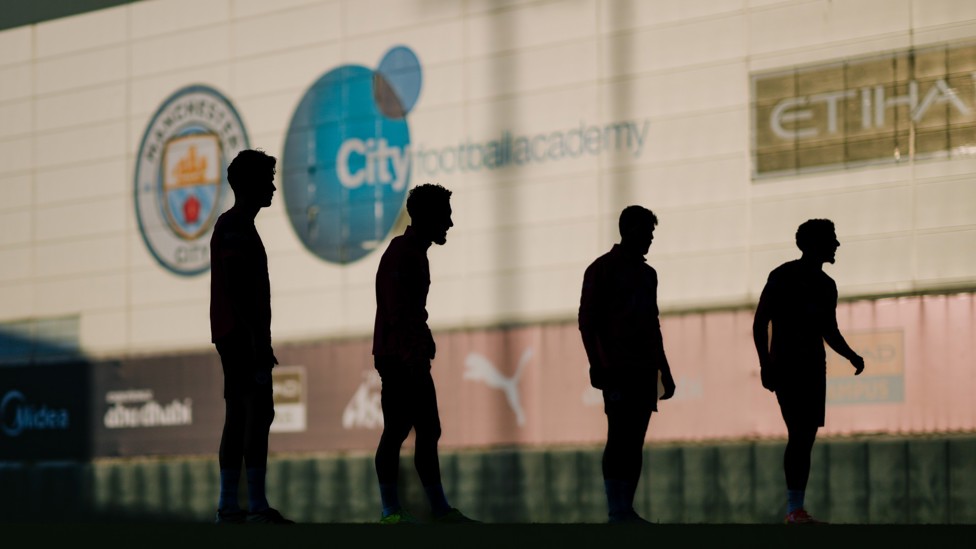 IN THE SHADOWS : A moody shot of the lads