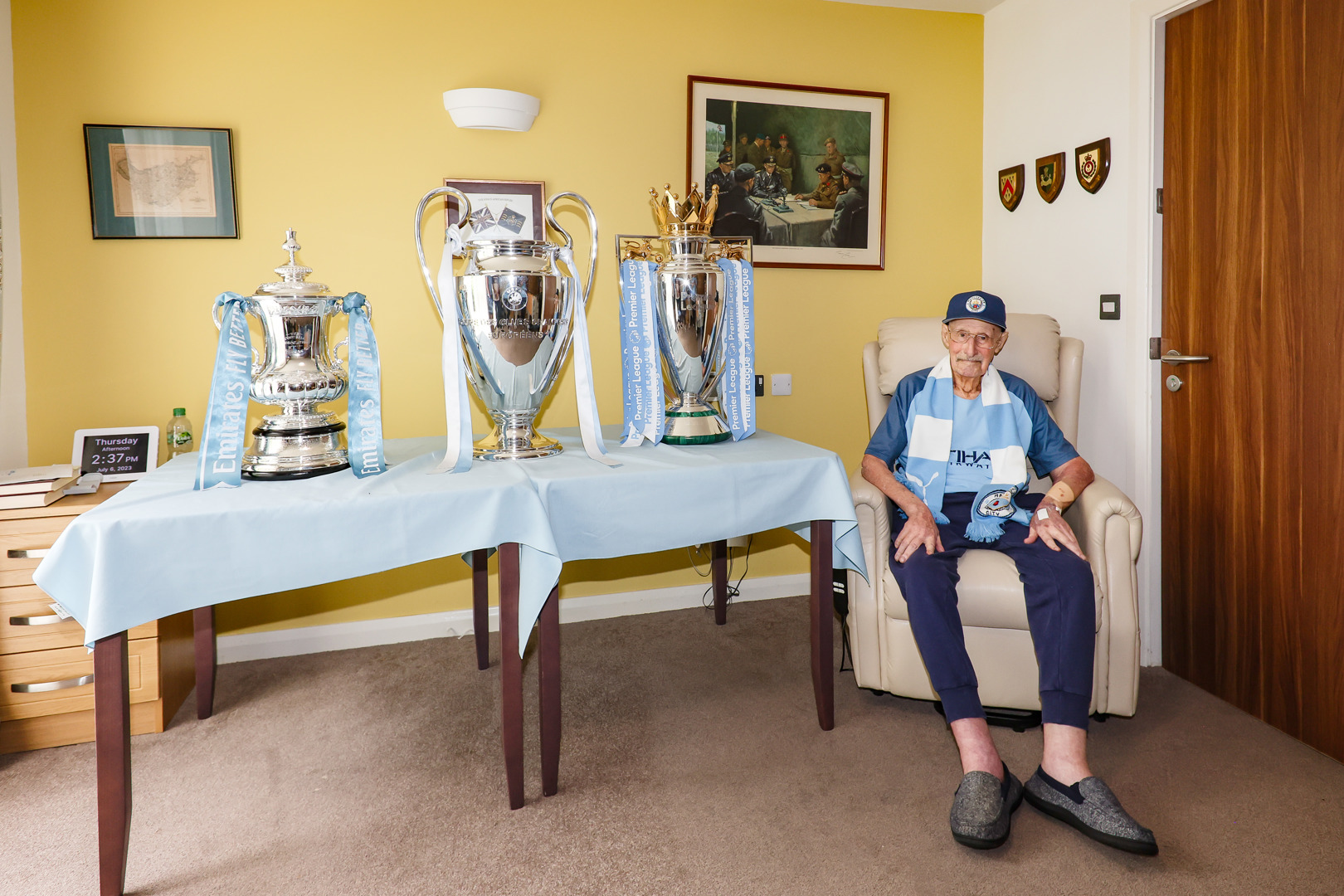 Our trophies visit 102-year-old City fan