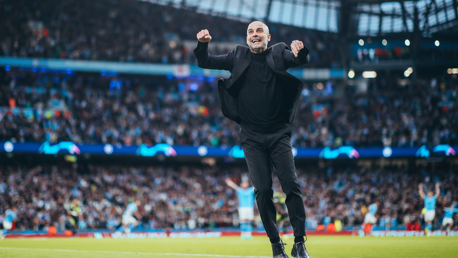 THE BOSS: Celebrates on the touchline.