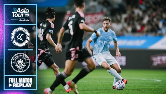 Manchester City player in action during a match against Team K League with logos and details of the Asia Tour '26 on the side.