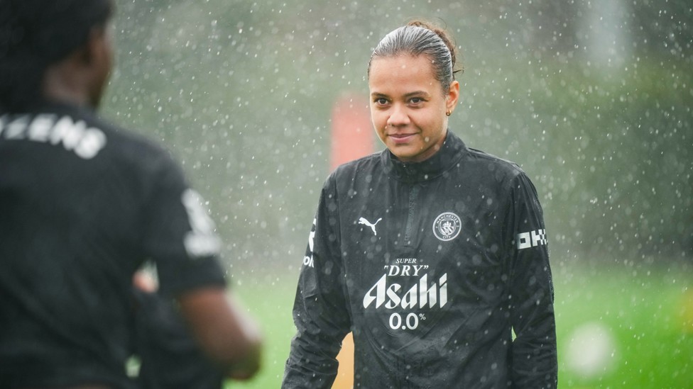 WELCOME TO CITY : Iman Beney becomes acquainted with the usual Manchester weather.
