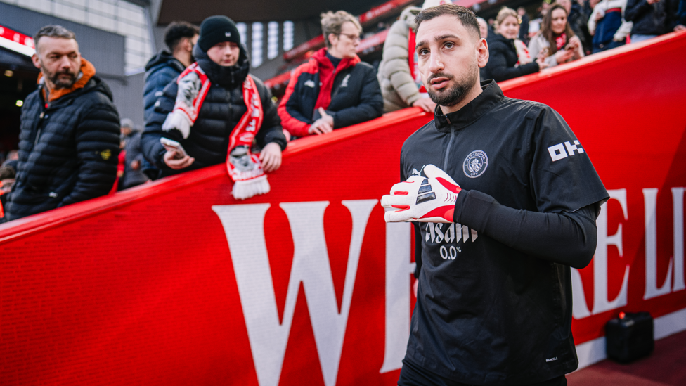 SAFE HANDS : Donnarumma emerges for the pre-match warm up.