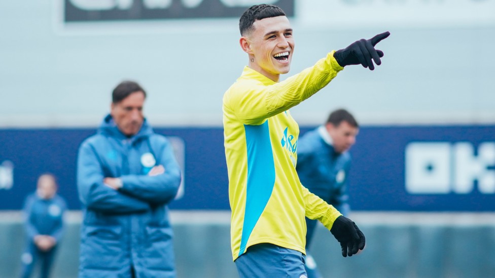 POINTING THE WAY : Phil Foden in high spirits as he looks to help City to a third straight FA Cup final