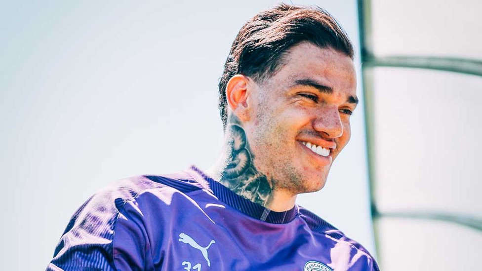 THAT FRIDAY FEELING! Goalkeeper Ederson was in buoyant mood ahead of training